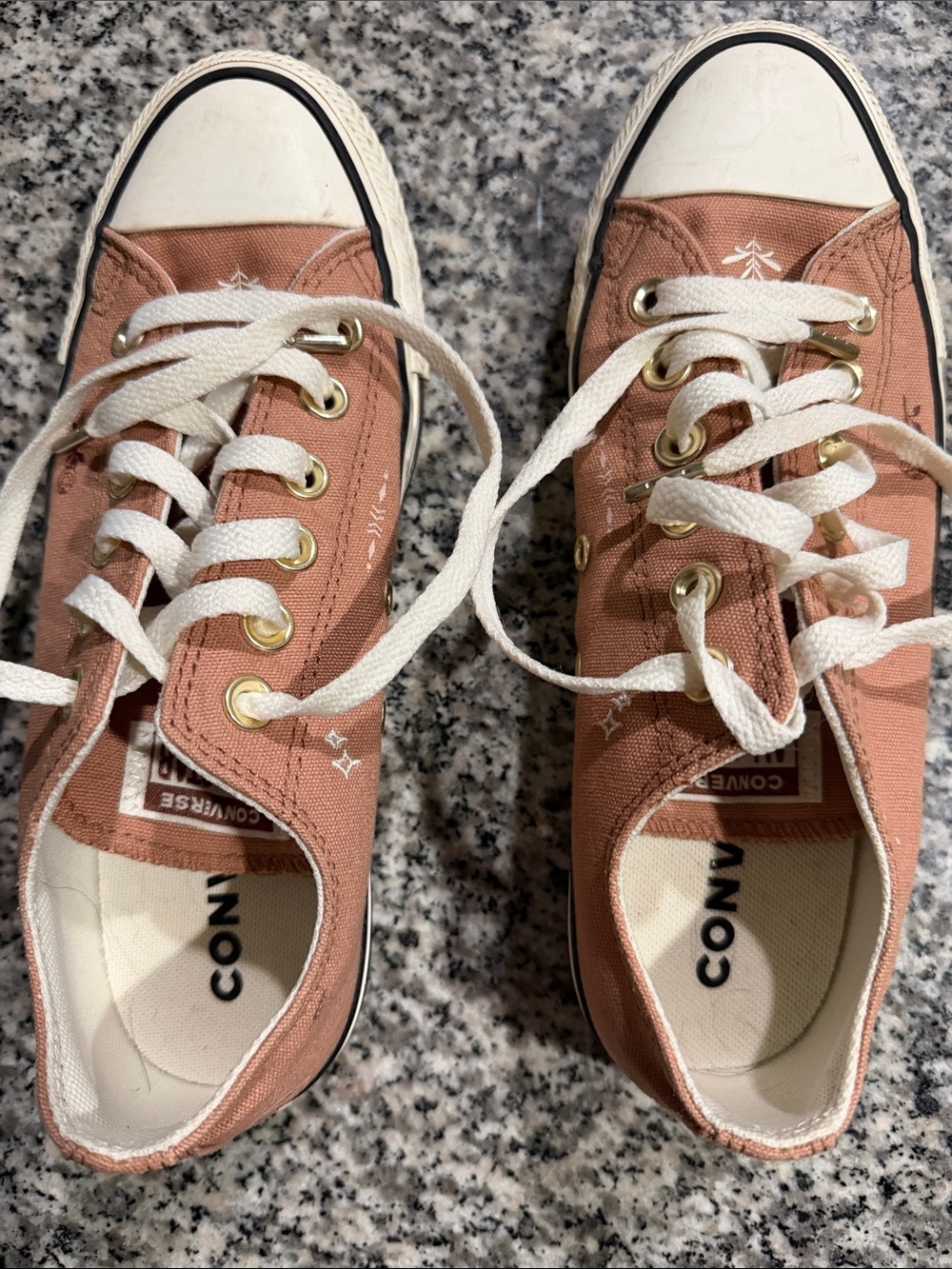 Converse Low Top Sneakers in Dusty Rose Pink with flash art tattoo accents